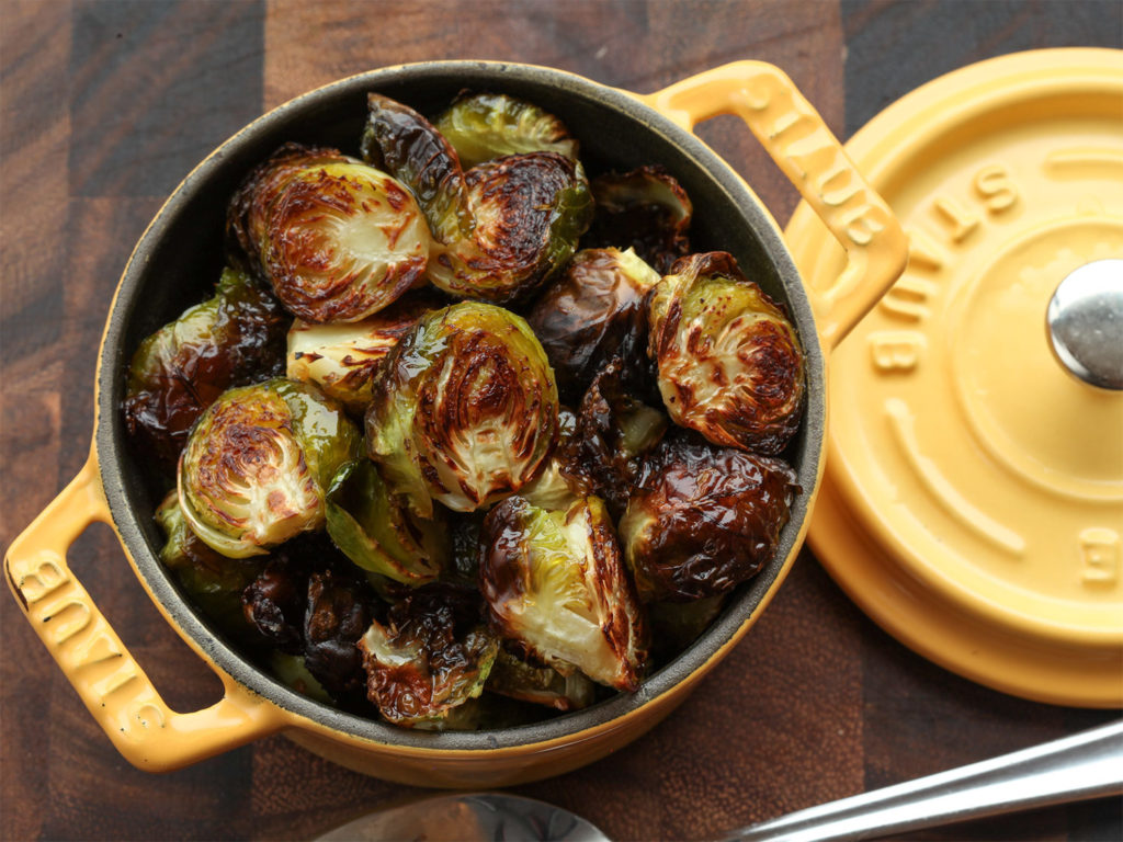 Thanksgiving brisket side dishes - white wine braised Brussels sprouts with "bacon" and raisins