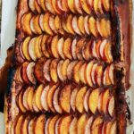 Overhead shot of a stone fruit tart.